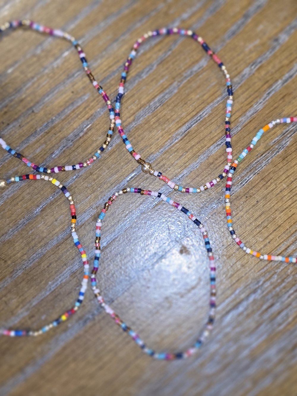 Multicolor Seed Bead Stretch Bracelet with Gold Accent